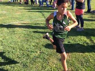 LGMS Invitational Cross Country Meet 2019 - Boy running in the race